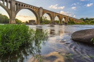 This concrete arch railroad bridge spanning the James River was built by the Atlantic Coast Line, Fredericksburg and Potomac Railroad in 1919 to route transportation of freight around Richmond, VA. ; Shutterstock ID 302377130; Your name (First / Last): Louise Bastock; GL account no.: 65050; Netsuite department name: Online Editorial; Full Product or Project name including edition: Best in the US 2018 landing page images